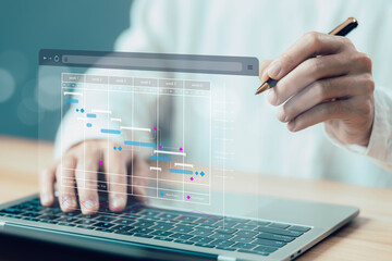 businessman schedule plan management shows a timeline Gantt chart in technology online, project...