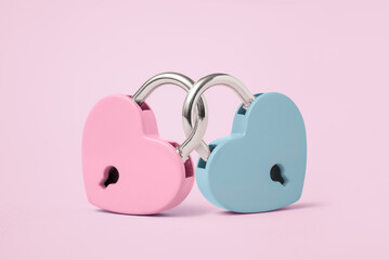 Minimal concept of Two Heart shaped padlock on pastel background. Valentine's Day card design. 14 february holiday symbol, romantic, love Concept. copy space