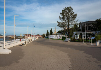 View of the promenade along the Black Sea on Primorskaya street and the Sea station of Sochi on a...