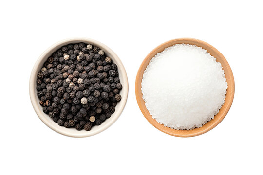 Natural sea salt and black pepper isolated on white background