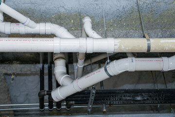 Industrial pipes in urban setting, conveying connectivity and infrastructure concept