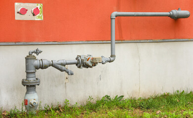 Industrial pipes in urban setting, conveying connectivity and infrastructure concept