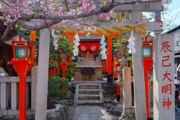 Kyoto, Japan - April 2 2023: Tatsumi Daimyojin Shrine situated nearby Tatsumu bashi bridge in Gion district