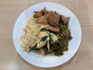 Vegetarian food over brown rice 