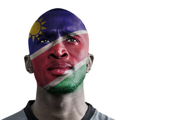Digital png photo of happy namibian man with flag on face on transparent background