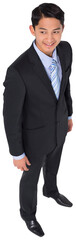 Digital png photo of happy biracial businessman standing and smiling on transparent background