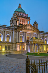 The illuminated Belfast City Hall at twilight