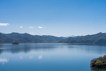 The Blue Sky and Clear Water of Lugu Lake in China