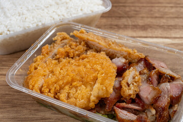 angle view fast food with chicken cutlets and bbq porks and rice at horizontal composition