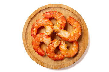 top view several peeled prawns on a white background