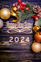 Happy new year 2024 on wooden brown background
