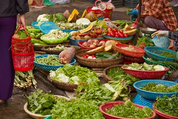 Fotobehang Fresh vegetables on display in a traditional market  © mnimage