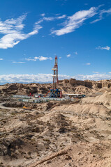 Oil Derrick Standing in the Desert