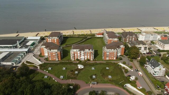Drone footage of a group of vacation homes directly on the German North Sea coast.