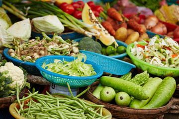 Fresh vegetables on display in a traditional market	