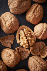 Walnuts on dark background