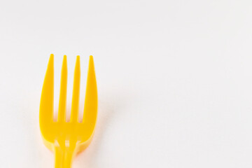 yellow fork on a white background