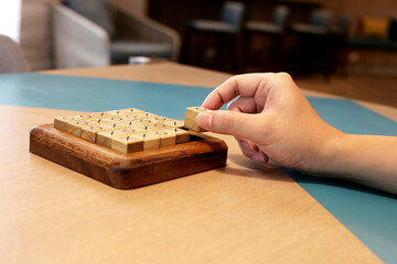 Wooden block OX game, OX tic tac toe game.