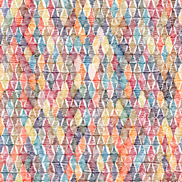 Seamless abstract ikat pattern. Grunge texture. Bohemian print for textiles. Vector illustration.