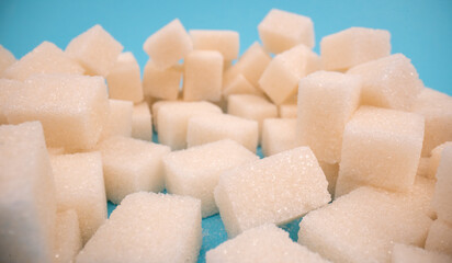 Sugar cubes close up on isolated.