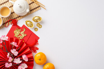 Immerse in richness of Chinese New Year with exquisite table setting. Top-view image showcasing...