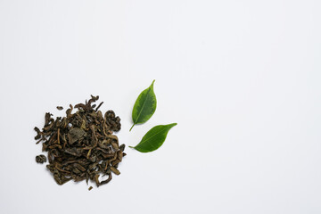 Dry green tea and fresh tea leaf isolated on a white background. Black Ceylon tea.  Flat lay, top view. Space for text.