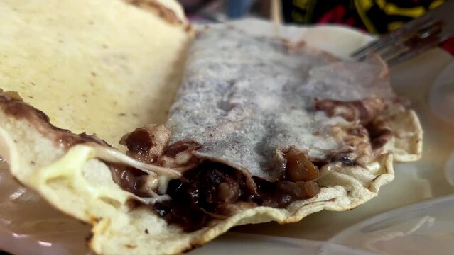 close up of Tlayuda traditional Mexican food