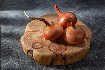 Onion Fruits On  Wooden Board.