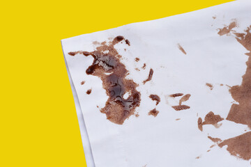 Dirty choclate stain on white shirt