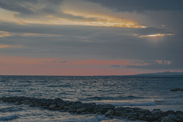 View of the Sunset along the Mediterranean Sea coastline of Pervolia village, south of Cape Kiti and south of Larnaca city, Cyprus 