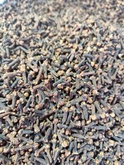 Cloves leaves, also known as clove basil or Thai basil, are aromatic leaves with a strong, clove-like flavor. They are commonly used in various culinary dishes