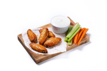 Buffalo spicy chicken wings with cayenne pepper sauce isolated on white background