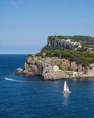 Beautiful view of the coast in Port de Soller, harbor for yachts and ships on the island of Mallorca, Spain, Mediterranean Sea