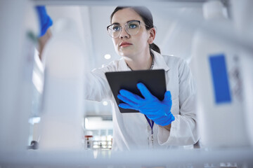 Woman, medical scientist and tablet in lab for test results check, future trial or science...