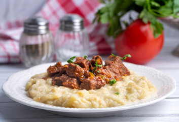 Turkish Food Hunkar Begendi made with Eggplant and Meat.