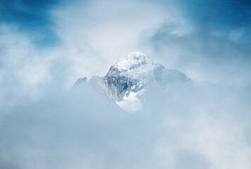 Fototapeta na wymiar Great view of the snow spire through thick fog. Location place Swiss alps, Grindelwald valley, Europe.