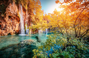 Majestic view on turquoise water and sunny beams. Location Plitvice Lakes National Park, Croatia,...