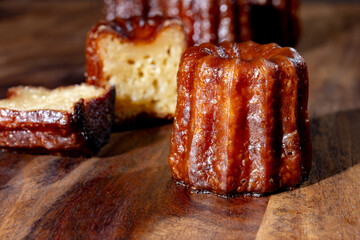 Canele, French pastry flavored with rum and vanilla, soft and tender custard center and  dark, caramelized crust specialty of Bordeaux region, France
