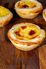 Portugal's traditional sweet dessert Pastel de nata egg custard tart pastry in cup