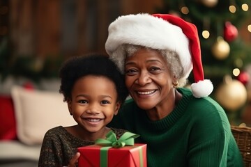 Fototapeta na wymiar African grandmother and granddaughter celebrating Christmas