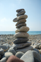 Fototapeta na wymiar pile of stones on beach