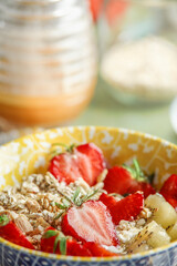 Close up of breakfast bowl with muesli and berries