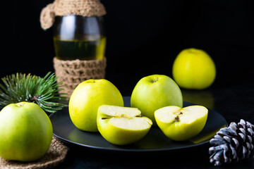 Ripe green apple fruits on dark stone table. Top view with copy space. Flat lay
