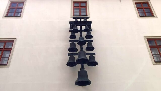 Bells in castle courtyard. Carillon on wall. Castle carillon. Spilberk castle. Brno, Czech Republic.