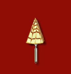 Merry Christmas and Happy New Year concept. Pastry slices and spoons created a Christmas tree. Restaurant and fast food concept. 