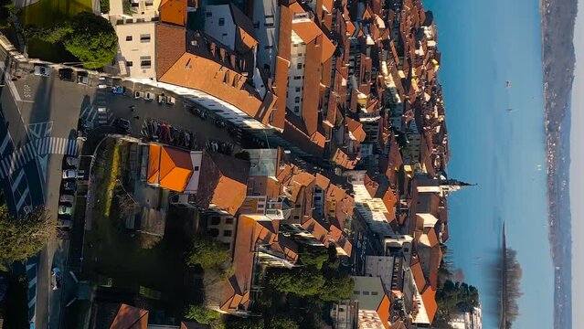 Arona, Italy Beautiful city surrounded by mountains and Lake Maggiore. Aerial view