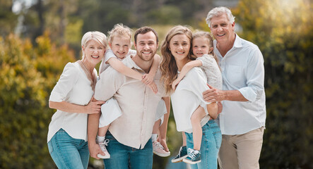 Portrait of big family in park with grandparents and parents with kids in backyard together. Nature, happiness and men, women and children with smile in garden with love, support and outdoor bonding.