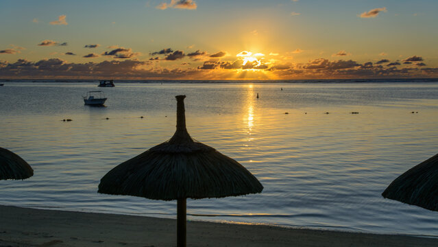Calm early morning sunrise on Solana Beach in Mauritius