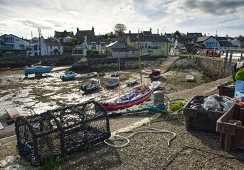 Cemaes Harbour Anglesey North Wales with boats and lobster pot
