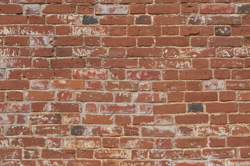 old with chips shabby dirty wall from red brick